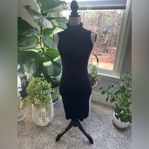 Romeo + Juliet Couture Woman’s Turtleneck dress  in gently used condition M